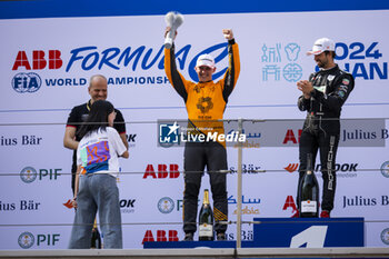 2024-05-26 - Podium, HUGHES Jake (gbr), NEOM McLaren Formula E Team, Nissan e-4ORCE 04, portrait during the 2024 Shanghai ePrix, 8th meeting of the 2023-24 ABB FIA Formula E World Championship, on the Shanghai International Circuit from May 24 to 26, 2024 in Shanghai, China - 2024 FORMULA E SHANGHAI EPRIX - FORMULA E - MOTORS