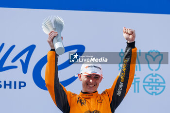 2024-05-26 - HUGHES Jake (gbr), NEOM McLaren Formula E Team, Nissan e-4ORCE 04, portrait podium during the 2024 Shanghai ePrix, 8th meeting of the 2023-24 ABB FIA Formula E World Championship, on the Shanghai International Circuit from May 24 to 26, 2024 in Shanghai, China - 2024 FORMULA E SHANGHAI EPRIX - FORMULA E - MOTORS