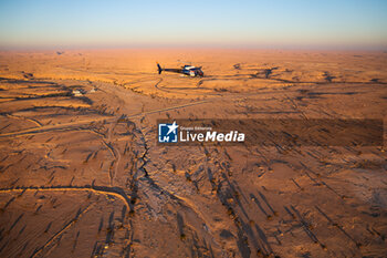 2024-01-09 - TV helicopter during the Stage 4 of the Dakar 2024 on January 9, 2024 between Al Salamiya and Al-Hofuf, Saudi Arabia - DAKAR 2024 - STAGE 4 - RALLY - MOTORS
