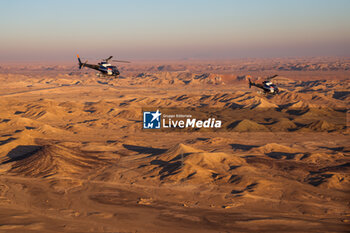 2024-01-09 - TV helicopters during the Stage 4 of the Dakar 2024 on January 9, 2024 between Al Salamiya and Al-Hofuf, Saudi Arabia - DAKAR 2024 - STAGE 4 - RALLY - MOTORS