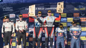 2024-02-18 - Elfyn Evans and Co-Driver Scott Martin and Esapekka Lappi Co-Driver and Janne Ferm and Adrien Fourmaux and Co-Driver Alexandre Coria,In Celebrating The Final Podium ,Compete During Fia World Rally Championship Wrc Rally Sweden 2024 18 February , Umea Sweden - FIA WORLD RALLY CHAMPIONSHIP WRC RALLY SWEDEN 2024  - RALLY - MOTORS