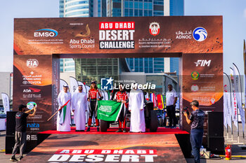 2024-02-26 - 305 AKEEL Dania (SAU), DUPLE Stephane (FRA), Taurus T3 Max, FIA/W2RC, ambiance during the starting podium of the 2024 Abu Dhabi Desert Challenge, on February 26, 2024 in Abu Dhabi, United Arab Emirates - W2RC - ABU DHABI DESERT CHALLENGE 2024 - RALLY - MOTORS