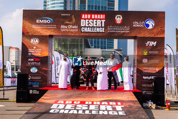 2024-02-26 - 408 FOURNIER Claude (FRA), GOUNON Serge (FRA), BRP Can-Am Maverick XRS TURBO RR, FIA W2RC, ambiance during the starting podium of the 2024 Abu Dhabi Desert Challenge, on February 26, 2024 in Abu Dhabi, United Arab Emirates - W2RC - ABU DHABI DESERT CHALLENGE 2024 - RALLY - MOTORS