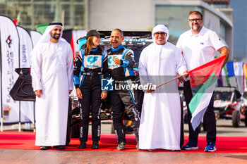 2024-02-26 - 406 BUSI Rebecca (ITA), LAFUENTE Sergio (URY), Onlyfans Racing, BRP Can-Am Maverick XRS TURBO RR, FIA W2RC, ambiance during the starting podium of the 2024 Abu Dhabi Desert Challenge, on February 26, 2024 in Abu Dhabi, United Arab Emirates - W2RC - ABU DHABI DESERT CHALLENGE 2024 - RALLY - MOTORS