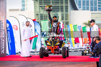 2024-02-26 - 174 AHLI Abdulaziz (ARE), Yamaha YFM 700R Raptor, FIM W2RC, ambiance during the starting podium of the 2024 Abu Dhabi Desert Challenge, on February 26, 2024 in Abu Dhabi, United Arab Emirates - W2RC - ABU DHABI DESERT CHALLENGE 2024 - RALLY - MOTORS