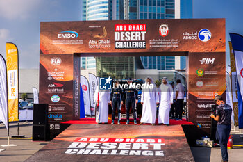 2024-02-26 - 215 BAUD Lionel (FRA), BAUD Lucie (FRA), Overdrive Racing, Toyota Hilux Overdrive, FIA W2RC, ambiance during the starting podium of the 2024 Abu Dhabi Desert Challenge, on February 26, 2024 in Abu Dhabi, United Arab Emirates - W2RC - ABU DHABI DESERT CHALLENGE 2024 - RALLY - MOTORS