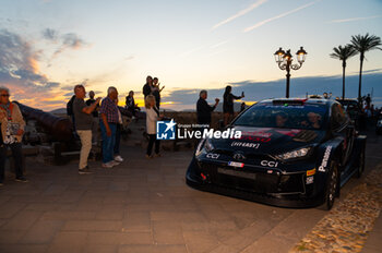 2024-05-30 - The driver Sebastien OGIER and is co-driver Vincent LANDAIS on Toyota GR Yaris Rally1 during the city parade of WRC Rally Italia Sardegna 2024 - WRC - RALLY D'ITALIA SARDEGNA - RALLY - MOTORS