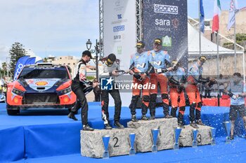 2024-06-02 - Driver Sebastien Ogier And Co-Driver Vincent Landais And Ott Tanak And Co-Driver Martin Jarveoja And Dani Sordo And Co-Driver Carrera Candido, In Celebrating The Final Podium in Alghero During Fia World Rally Championship Wrc Rally Italia Sardegna 2024 02 June, Alghero Italy - FIA WORLD RALLY CHAMPIONSHIP WRC RALLY ITALIA SARDEGNA 2024  - RALLY - MOTORS