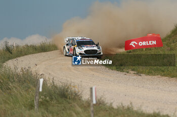 2024-06-28 - The Driver Gregoire Munster And Co-Driver Louis Louka Of The Team M-Sport Ford World Rally Team Ford Puma Rally1 Hybrid,They Face The 2nd, Of The Race,During Fia World Rally Championship Wrc Orlen 80Th Rally Poland 2024 ,28 June,Mikolajki Poland - FIA WORLD RALLY CHAMPIONSHIP WRC ORLEN 80TH RALLY POLAND 2024 - RALLY - MOTORS