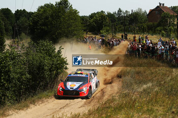 2024-06-30 - The Driver Thierry Neuville And Co-Driver Martijn Wydaeghe Of The Team Hyundai Shell Mobis World Rally Team,Hyundai I20 N Rally1 Hybrid,They Face The 4th Of The Race, During Fia World Rally Championship Wrc Orlen 80Th Rally Poland 2024 ,30 June,Mikolajki Poland -  FIA WORLD RALLY CHAMPIONSHIP WRC ORLEN 80TH RALLY POLAND 2024 - RALLY - MOTORS