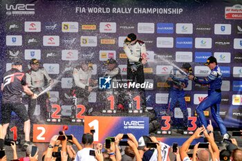 2024-06-30 - Jari-Matti Latvala Team Principal And Driver Elfyn Evans And Co-Driver Scott Martin ,And Kalle Rovanpera And Co-Driver Jonne Halttunen And Driver Adrien Fourmaux And Co-Driver , The Final Podium,During Fia World Rally Championship Wrc Orlen 80Th Rally Poland 2024 ,30 June,Mikolajki Poland -  FIA WORLD RALLY CHAMPIONSHIP WRC ORLEN 80TH RALLY POLAND 2024 - RALLY - MOTORS