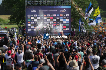 2024-07-21 - Driver Sebastien Ogier And Co-Driver Vincent Landais And Rovanpera And Co-Driver Jonne Halttunen And Driver Ott Tanak And Co-Driver Martin JarveojaCelebrating The Final Podium,During Fia World Rally Championship WRC Tet Rally Latvia 2024 21 July Riga Latvia - FIA WORLD RALLY CHAMPIONSHIP  WRC TET RALLY LATVIA 2024 - RALLY - MOTORS