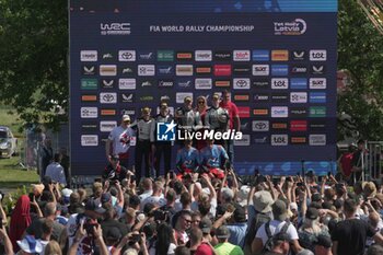 2024-07-21 - Driver Sebastien Ogier And Co-Driver Vincent Landais And Rovanpera And Co-Driver Jonne Halttunen And Driver Ott Tanak And Co-Driver Martin JarveojaCelebrating The Final Podium,During Fia World Rally Championship WRC Tet Rally Latvia 2024 21 July Riga Latvia - FIA WORLD RALLY CHAMPIONSHIP  WRC TET RALLY LATVIA 2024 - RALLY - MOTORS