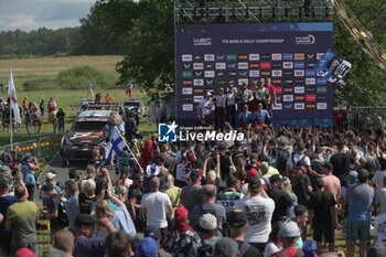 2024-07-21 - Driver Sebastien Ogier And Co-Driver Vincent Landais And Rovanpera And Co-Driver Jonne Halttunen And Driver Ott Tanak And Co-Driver Martin JarveojaCelebrating The Final Podium,During Fia World Rally Championship WRC Tet Rally Latvia 2024 21 July Riga Latvia - FIA WORLD RALLY CHAMPIONSHIP  WRC TET RALLY LATVIA 2024 - RALLY - MOTORS