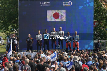 2024-07-21 - Driver Sebastien Ogier And Co-Driver Vincent Landais And Rovanpera And Co-Driver Jonne Halttunen And Driver Ott Tanak And Co-Driver Martin JarveojaCelebrating The Final Podium,During Fia World Rally Championship WRC Tet Rally Latvia 2024 21 July Riga Latvia - FIA WORLD RALLY CHAMPIONSHIP  WRC TET RALLY LATVIA 2024 - RALLY - MOTORS