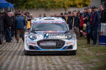 2024-10-17 - Grégoire MUNSTER(Lux),Louis LOUKA(Bel) on a FORD Puma Rally HYBRID of a team M-SPORT FORD WORLD RALLY TEAM in a service park during WRC Central European Rally 17-20 October 2024 - WRC CENTRAL EUROPEAN RALLY - RALLY - MOTORS