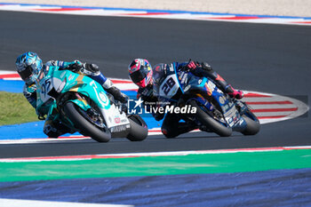 2024-06-15 - (95) Tarran Mackenzie from United Kingdom of Petronas MIE Racing Honda Racing Team, rides Honda CBR1000 RR and (28) Bradley Ray from United Kingdom of Yamaha Motoracing World SBK Team, rides Yamaha YZF R1 in action during the FIM Motul Superbike World Championship - Free practice session of Emilia Romagna Round at Marco Simoncelli World Circuit in Misano Adriatico on June 15, 2024 in Misano Adriatico, Rimini, Italy. - PIRELLI EMILIA ROMAGNA ROUND - FREE PRACTICE - SUPERBIKE - MOTORS