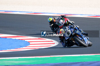 2024-06-15 - (5) Philipp Oettl from Germany of Team GMT94 Yamaha, rides Yamaha YZF R1 followed by(53) Tito Rabat from Spain of Kawasaki Puccetti Racing, rides Kawasaki ZX-10RR in action during the FIM Motul Superbike World Championship - Free practice session of Emilia Romagna Round at Marco Simoncelli World Circuit in Misano Adriatico on June 15, 2024 in Misano Adriatico, Rimini, Italy. - PIRELLI EMILIA ROMAGNA ROUND - FREE PRACTICE - SUPERBIKE - MOTORS