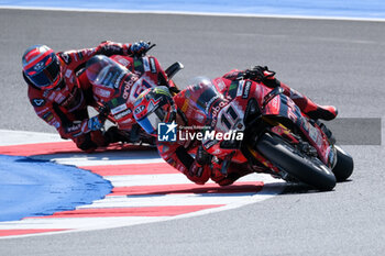 2024-06-15 - (11) Nicolo Bulega from Italy of Aruba.it Ducati Team, rides Ducati Panigale V4R in action during the FIM Motul Superbike World Championship - Tissot Superpole race 1 of Emilia Romagna Round at Marco Simoncelli World Circuit in Misano Adriatico on June 15, 2024 in Misano Adriatico, Rimini, Italy. - PIRELLI EMILIA ROMAGNA ROUND - TISSOT SUPERPOLE - SUPERBIKE - MOTORS