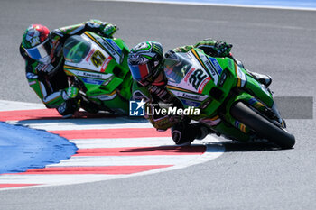 2024-06-15 - (22) Alex Lowes from United Kingdom of Kawasaki Racing Team World SBK, rides Kawasaki ZX-10RR followed by (47) Axel Bassani from Italy of Kawasaki Racing Team WorldSBY, rides Kawasaki ZX-10RR in action during the FIM Motul Superbike World Championship - Tissot Superpole race 1 of Emilia Romagna Round at Marco Simoncelli World Circuit in Misano Adriatico on June 15, 2024 in Misano Adriatico, Rimini, Italy. - PIRELLI EMILIA ROMAGNA ROUND - TISSOT SUPERPOLE - SUPERBIKE - MOTORS