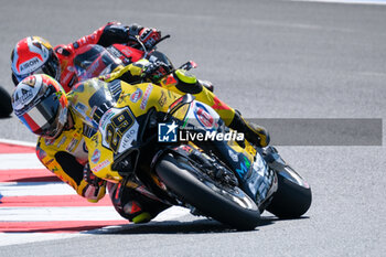 2024-06-15 - (29) Andrea Iannone from Italy of Team GoEleven, rides Ducati Panigale V4R in action during the FIM Motul Superbike World Championship - Tissot Superpole race 1 of Emilia Romagna Round at Marco Simoncelli World Circuit in Misano Adriatico on June 15, 2024 in Misano Adriatico, Rimini, Italy. - PIRELLI EMILIA ROMAGNA ROUND - TISSOT SUPERPOLE - SUPERBIKE - MOTORS