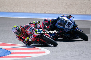 2024-06-15 - (1) Alvaro Bautista from Spain of Aruba.it Ducati Team, rides Ducati Panigale V4R and (28) Bradley Ray from United Kingdom of Yamaha Motoracing World SBK Team, rides Yamaha YZF R1 in action during the FIM Motul Superbike World Championship - Tissot Superpole race 1 of Emilia Romagna Round at Marco Simoncelli World Circuit in Misano Adriatico on June 15, 2024 in Misano Adriatico, Rimini, Italy. - PIRELLI EMILIA ROMAGNA ROUND - TISSOT SUPERPOLE - SUPERBIKE - MOTORS