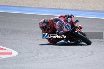 2024-06-15 - (11) Nicolo Bulega from Italy of Aruba.it Ducati Team, rides Ducati Panigale V4R in action during the FIM Motul Superbike World Championship - Tissot Superpole race 1 of Emilia Romagna Round at Marco Simoncelli World Circuit in Misano Adriatico on June 15, 2024 in Misano Adriatico, Rimini, Italy. - PIRELLI EMILIA ROMAGNA ROUND - TISSOT SUPERPOLE - SUPERBIKE - MOTORS