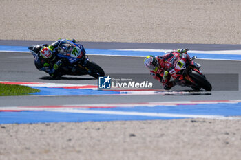 2024-06-15 - (1) Alvaro Bautista from Spain of Aruba.it Ducati Team, rides Ducati Panigale V4R and\ (77) Dominique Aegerter from Switzerland of GYTR GRT Yamaha WorldSBK Team, rides Yamaha YZF R1 in action during the FIM Motul Superbike World Championship - Tissot Superpole race 1 of Emilia Romagna Round at Marco Simoncelli World Circuit in Misano Adriatico on June 15, 2024 in Misano Adriatico, Rimini, Italy. - PIRELLI EMILIA ROMAGNA ROUND - TISSOT SUPERPOLE - SUPERBIKE - MOTORS