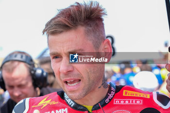 2024-06-15 - (1) Alvaro Bautista from Spain of Aruba.it Ducati Team, rides Ducati Panigale V4R during the FIM Motul Superbike World Championship - Race 1 of Emilia Romagna Round at Marco Simoncelli World Circuit in Misano Adriatico on June 15, 2024 in Misano Adriatico, Rimini, Italy. - PIRELLI EMILIA ROMAGNA ROUND - RACE 1 - SUPERBIKE - MOTORS