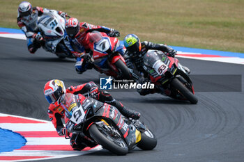 2024-06-15 - (9) Danilo Petrucci from Italy of Brani Spark Racing Team, rides Ducati Panigale V4R in action during the FIM Motul Superbike World Championship - Race 1 of Emilia Romagna Round at Marco Simoncelli World Circuit in Misano Adriatico on June 15, 2024 in Misano Adriatico, Rimini, Italy. - PIRELLI EMILIA ROMAGNA ROUND - RACE 1 - SUPERBIKE - MOTORS