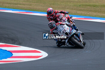 2024-06-15 - (45) Scott Redding from United Kingdom of Bonovo Action BMW Team, rides BMW M1000 RR in action during the FIM Motul Superbike World Championship - Race 1 of Emilia Romagna Round at Marco Simoncelli World Circuit in Misano Adriatico on June 15, 2024 in Misano Adriatico, Rimini, Italy. - PIRELLI EMILIA ROMAGNA ROUND - RACE 1 - SUPERBIKE - MOTORS