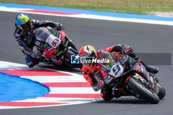 2024-06-15 - (9) Danilo Petrucci from Italy of Brani Spark Racing Team, rides Ducati Panigale V4R in action during the FIM Motul Superbike World Championship - Race 1 of Emilia Romagna Round at Marco Simoncelli World Circuit in Misano Adriatico on June 15, 2024 in Misano Adriatico, Rimini, Italy. - PIRELLI EMILIA ROMAGNA ROUND - RACE 1 - SUPERBIKE - MOTORS