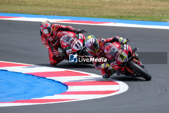 2024-06-15 - (1) Alvaro Bautista from Spain of Aruba.it Ducati Team, rides Ducati Panigale V4R followed by (11) Nicolo Bulega from Italy of Aruba.it Ducati Team, rides Ducati Panigale V4Rin action during the FIM Motul Superbike World Championship - Race 1 of Emilia Romagna Round at Marco Simoncelli World Circuit in Misano Adriatico on June 15, 2024 in Misano Adriatico, Rimini, Italy. - PIRELLI EMILIA ROMAGNA ROUND - RACE 1 - SUPERBIKE - MOTORS