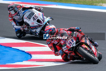 2024-06-15 - (51) Michele Pirro from Italy of Aruba.it - Ducati Team, rides Ducati Panigale V4R in action during the FIM Motul Superbike World Championship - Race 1 of Emilia Romagna Round at Marco Simoncelli World Circuit in Misano Adriatico on June 15, 2024 in Misano Adriatico, Rimini, Italy. - PIRELLI EMILIA ROMAGNA ROUND - RACE 1 - SUPERBIKE - MOTORS