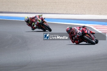 2024-06-15 - (11) Nicolo Bulega from Italy of Aruba.it Ducati Team, rides Ducati Panigale V4R in action during the FIM Motul Superbike World Championship - Race 1 of Emilia Romagna Round at Marco Simoncelli World Circuit in Misano Adriatico on June 15, 2024 in Misano Adriatico, Rimini, Italy. - PIRELLI EMILIA ROMAGNA ROUND - RACE 1 - SUPERBIKE - MOTORS