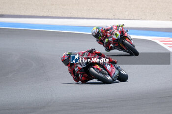 2024-06-15 - (11) Nicolo Bulega from Italy of Aruba.it Ducati Team, rides Ducati Panigale V4R in action during the FIM Motul Superbike World Championship - Race 1 of Emilia Romagna Round at Marco Simoncelli World Circuit in Misano Adriatico on June 15, 2024 in Misano Adriatico, Rimini, Italy. - PIRELLI EMILIA ROMAGNA ROUND - RACE 1 - SUPERBIKE - MOTORS