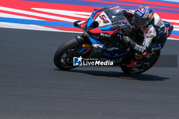 2024-06-15 - (54) Toprak Razgatlioglu from Turkey of ROKiT BMW Motored WorldSBK Team, rides BMW M1000 RR in action during the FIM Motul Superbike World Championship - Race 1 of Emilia Romagna Round at Marco Simoncelli World Circuit in Misano Adriatico on June 15, 2024 in Misano Adriatico, Rimini, Italy. - PIRELLI EMILIA ROMAGNA ROUND - RACE 1 - SUPERBIKE - MOTORS