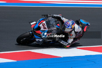 2024-06-15 - (54) Toprak Razgatlioglu from Turkey of ROKiT BMW Motored WorldSBK Team, rides BMW M1000 RR in action during the FIM Motul Superbike World Championship - Race 1 of Emilia Romagna Round at Marco Simoncelli World Circuit in Misano Adriatico on June 15, 2024 in Misano Adriatico, Rimini, Italy. - PIRELLI EMILIA ROMAGNA ROUND - RACE 1 - SUPERBIKE - MOTORS