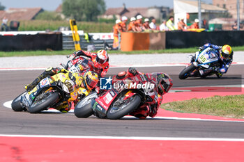 2024-09-21 - (11) Nicolo Bulega from Italy of Aruba.it Ducati Team, rides Ducati Panigale V4R followed by (29) Andrea Iannone from Italy of Team GoEleven, rides Ducati Panigale V4R in action during the FIM Motul Superbike World Championship - Race 1 of Acerbis Italian Round at Cremona Circuit in San Martino del Lago on September 21, 2024, Cremona, Italy. - ACERBIS ITALIAN ROUND - SUPERBIKE - MOTORS