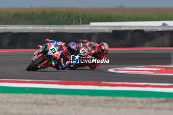 2024-09-21 - (21) Michael Ruben Rinaldi from Italy of Team Motocorsa Racing, rides Ducati Panigale V4R followed by (11) Nicolo Bulega from Italy of Aruba.it Ducati Team, rides Ducati Panigale V4R in action during the FIM Motul Superbike World Championship - Free practice session of Acerbis Italian Round at Cremona Circuit in San Martino del Lago on September 21, 2024, Cremona, Italy. - ACERBIS ITALIAN ROUND - FREE PRACTICE - SUPERBIKE - MOTORS