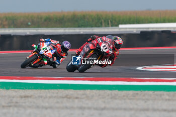 2024-09-21 - (11) Nicolo Bulega from Italy of Aruba.it Ducati Team, rides Ducati Panigale V4R followed by (21) Michael Ruben Rinaldi from Italy of Team Motocorsa Racing, rides Ducati Panigale V4R in action during the FIM Motul Superbike World Championship - Free practice session of Acerbis Italian Round at Cremona Circuit in San Martino del Lago on September 21, 2024, Cremona, Italy. - ACERBIS ITALIAN ROUND - FREE PRACTICE - SUPERBIKE - MOTORS