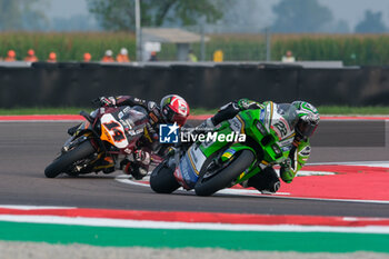 2024-09-21 - (22) Alex Lowes from United Kingdom of Kawasaki Racing Team World SBK, rides Kawasaki ZX-10RR followed by (14) Sam Lowes from United Kingdom of ELF Marc VDS Racing Team, rides Ducati Panigale V4R in action during the FIM Motul Superbike World Championship - Free practice session of Acerbis Italian Round at Cremona Circuit in San Martino del Lago on September 21, 2024, Cremona, Italy. - ACERBIS ITALIAN ROUND - FREE PRACTICE - SUPERBIKE - MOTORS