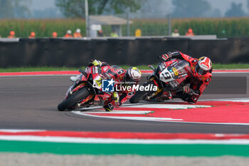 2024-09-21 - (1) Alvaro Bautista from Spain of Aruba.it Ducati Team, rides Ducati Panigale V4R followed by (9) Danilo Petrucci from Italy of Brani Spark Racing Team, rides Ducati Panigale V4R in action during the FIM Motul Superbike World Championship - Free practice session of Acerbis Italian Round at Cremona Circuit in San Martino del Lago on September 21, 2024, Cremona, Italy. - ACERBIS ITALIAN ROUND - FREE PRACTICE - SUPERBIKE - MOTORS