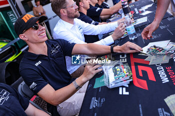 2024-05-18 - #7 Mattia Drudi Of The Team Comtoyou Racing, Aston Martin Vantage Amr Gt3 Evo, He Faces Autograph Session During Fanatec GT World Challange Misano 2024 , 18 May , In Misano , Italy - FANATEC GT WORLD CHALLANGE MISANO 2024 - GRAND TOURISM - MOTORS