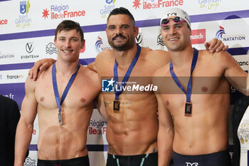 2024-03-23 - Maxime Grousset of France, Florent Manaudou of France and Michael Andrew of USA, Men's 50 M Freestyle during the Giant Open 2024, Swimming event on March 23, 2024 at Le Dôme in Saint-Germain-en-Laye, France - SWIMMING - GIANT OPEN 2024 - SWIMMING - SWIMMING