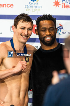2024-03-24 - Maxime GROUSSET (FRA)and Siya KOLISI capitain of the South african rugby team, men 100m freestyle swimming final, during the Giant Open 2024, Swimming event on March 24, 2024 at Le Dôme in Saint-Germain-en-Laye, France - SWIMMING - GIANT OPEN 2024 - SWIMMING - SWIMMING