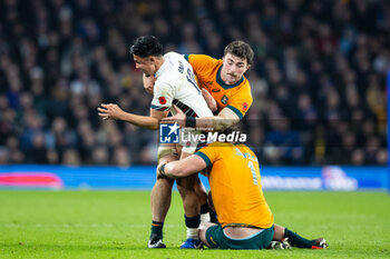 09/11/2024 - Marcus Smith of England under pressure from Angus Bell of Australia during the Autumn Nations Series 2024 rugby union match between England and Australia on 9 November 2024 at Allianz Stadium in Twickenham, England - RUGBY - AUTUMN NATIONS SERIES 2024 - ENGLAND V AUSTRALIA - AUTUMN NATIONS SERIES - RUGBY