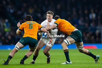 09/11/2024 - Tommy Freeman of England under pressure from Nick Frost of Australia during the Autumn Nations Series 2024 rugby union match between England and Australia on 9 November 2024 at Allianz Stadium in Twickenham, England - RUGBY - AUTUMN NATIONS SERIES 2024 - ENGLAND V AUSTRALIA - AUTUMN NATIONS SERIES - RUGBY