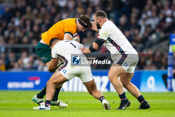 09/11/2024 - Jeremy Williams of Australia is tackled by Ellis Genge of England during the Autumn Nations Series 2024 rugby union match between England and Australia on 9 November 2024 at Allianz Stadium in Twickenham, England - RUGBY - AUTUMN NATIONS SERIES 2024 - ENGLAND V AUSTRALIA - AUTUMN NATIONS SERIES - RUGBY