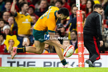 2024-11-17 - Tom Wright of Australia scores his sides eighth try during the 2024 Autumn Nations Series rugby union match between Wales and Australia on 17 November 2024 at Millenium Stadium in Cardiff, Wales - RUGBY - AUTUMN NATIONS SERIES 2024 - WALES V AUSTRALIA - AUTUMN NATIONS SERIES - RUGBY